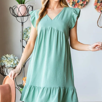 Heimish Full Size Short Sleeve V Neck Ruffled Hem Dress - Image 1